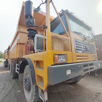 Массовый демпер с ручной трансмиссией на шасси Sinotruk с механическим подъемом руля
